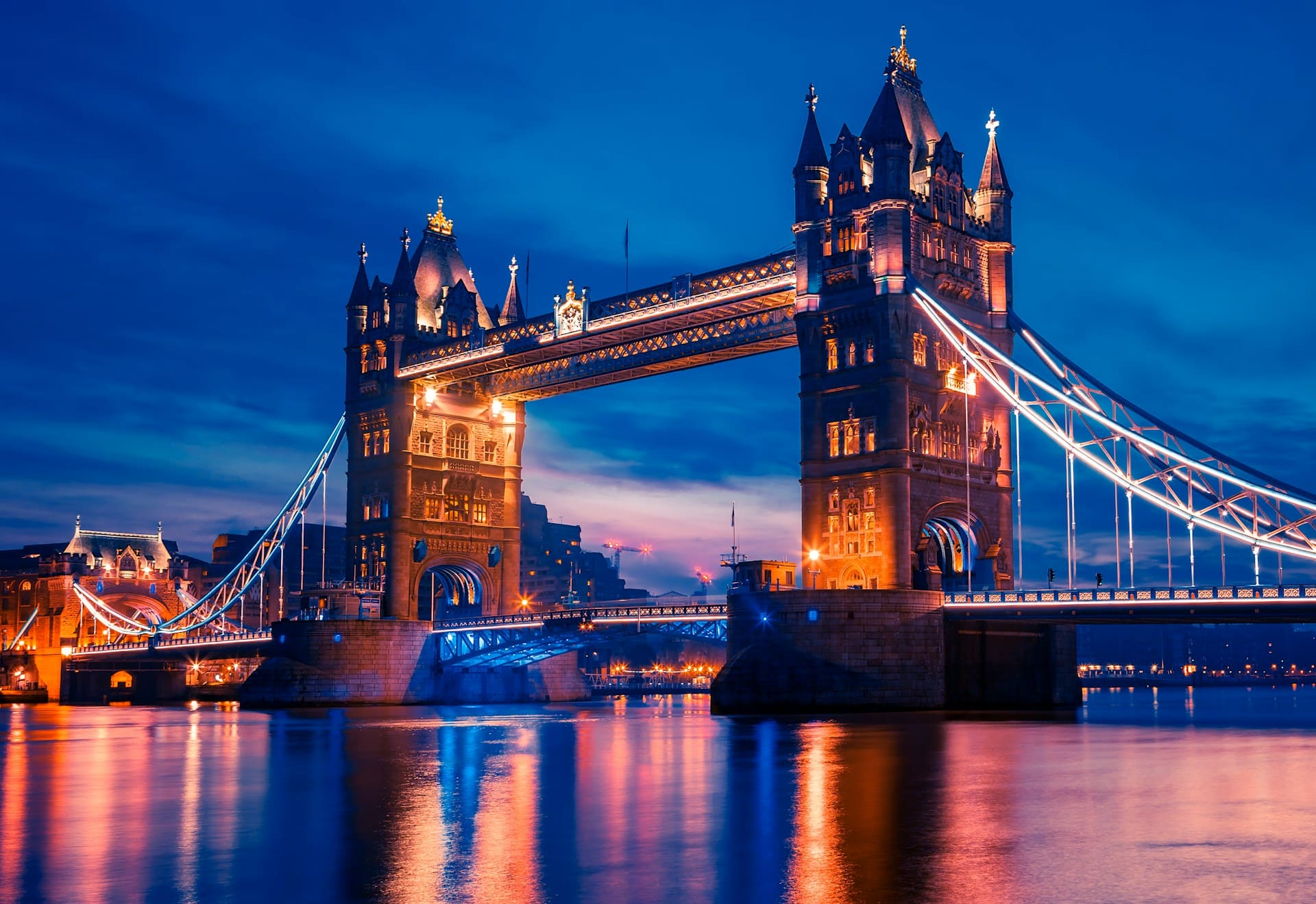 Tower Bridge in London, England at night, representing multijurisdictional contract disputes in British Columbia